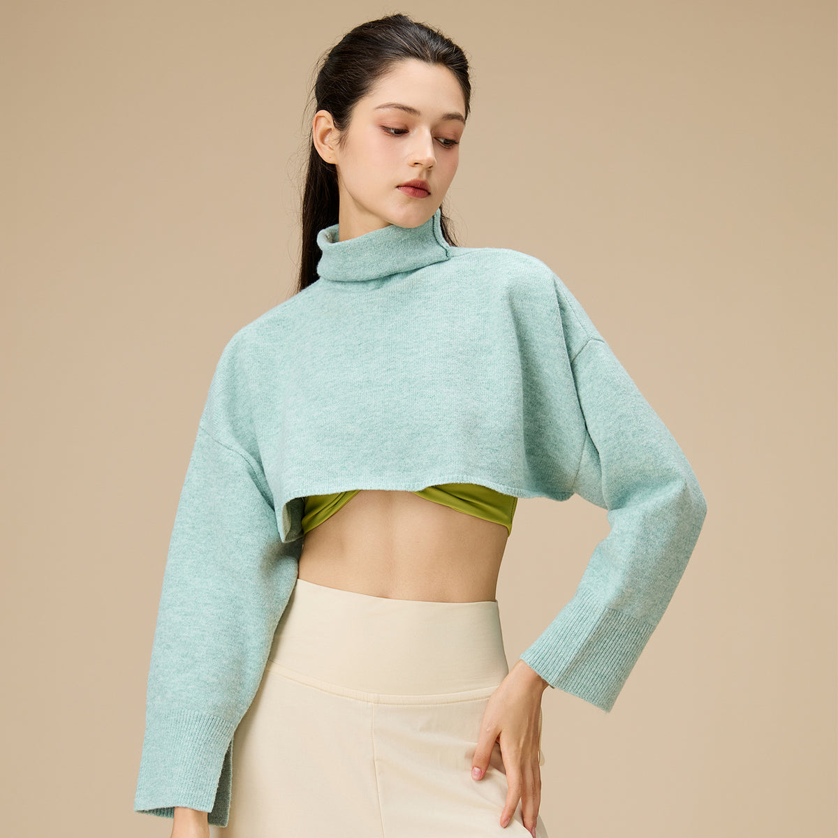 Light mint cropped turtleneck yoga blouse with long sleeves
