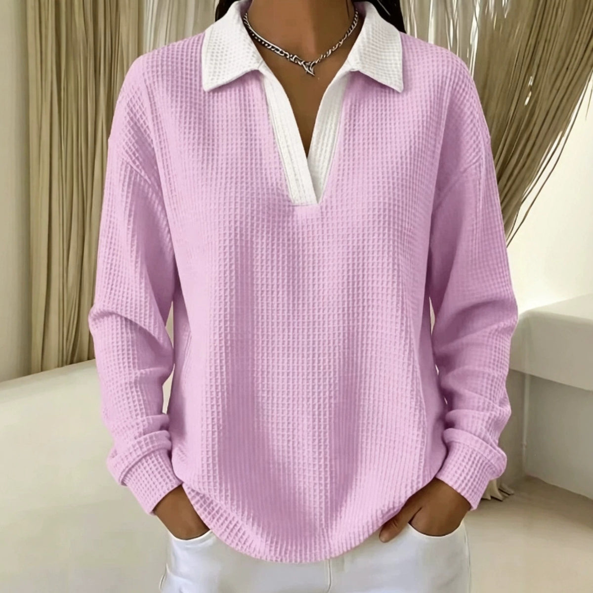 Light pink waffle-knit V-neck long-sleeve polo shirt with white contrast collar and placket
