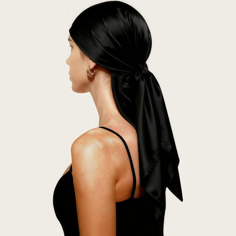 Black satin square scarf headscarf tied with a long bow at the back