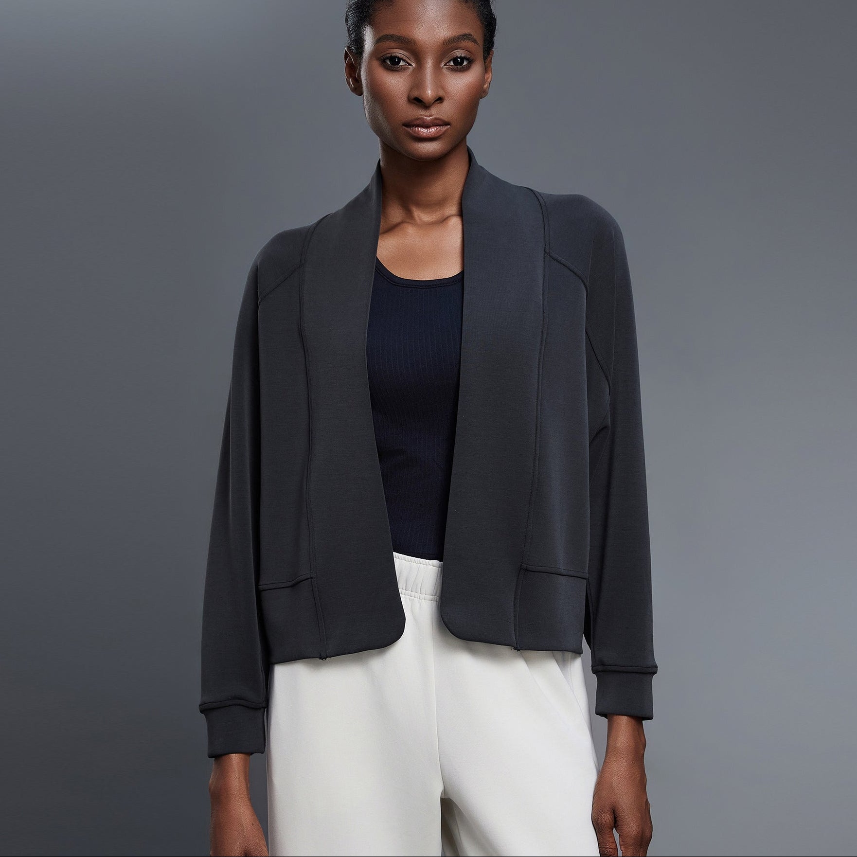 Women’s black cropped cardigan with shawl collar, open front and side pockets