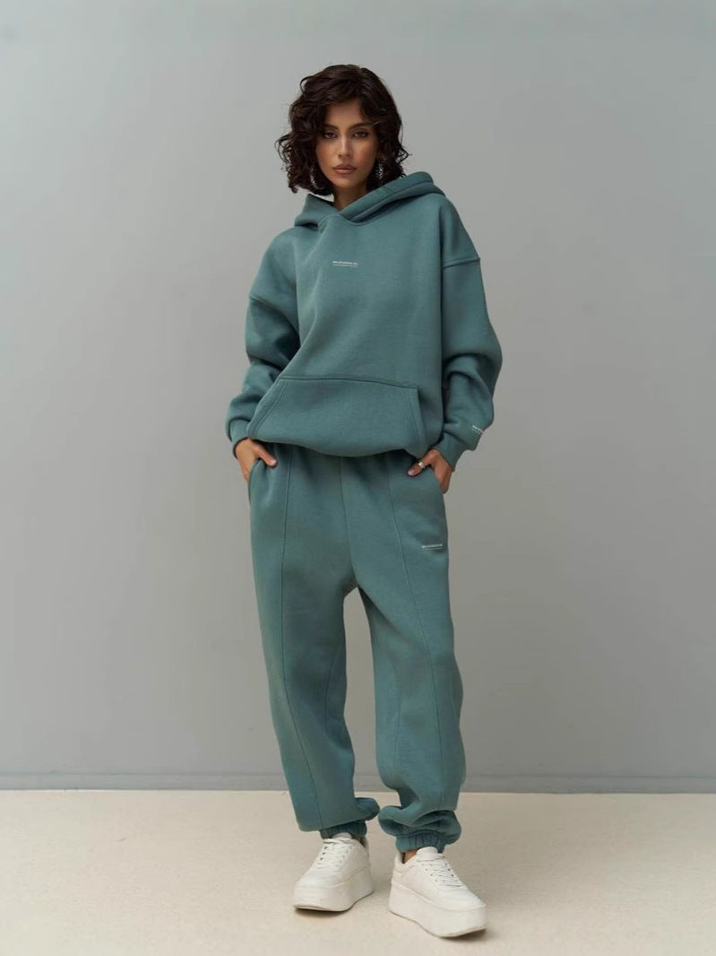 Teal hooded sweatshirt and matching jogger pants set, front kangaroo pocket