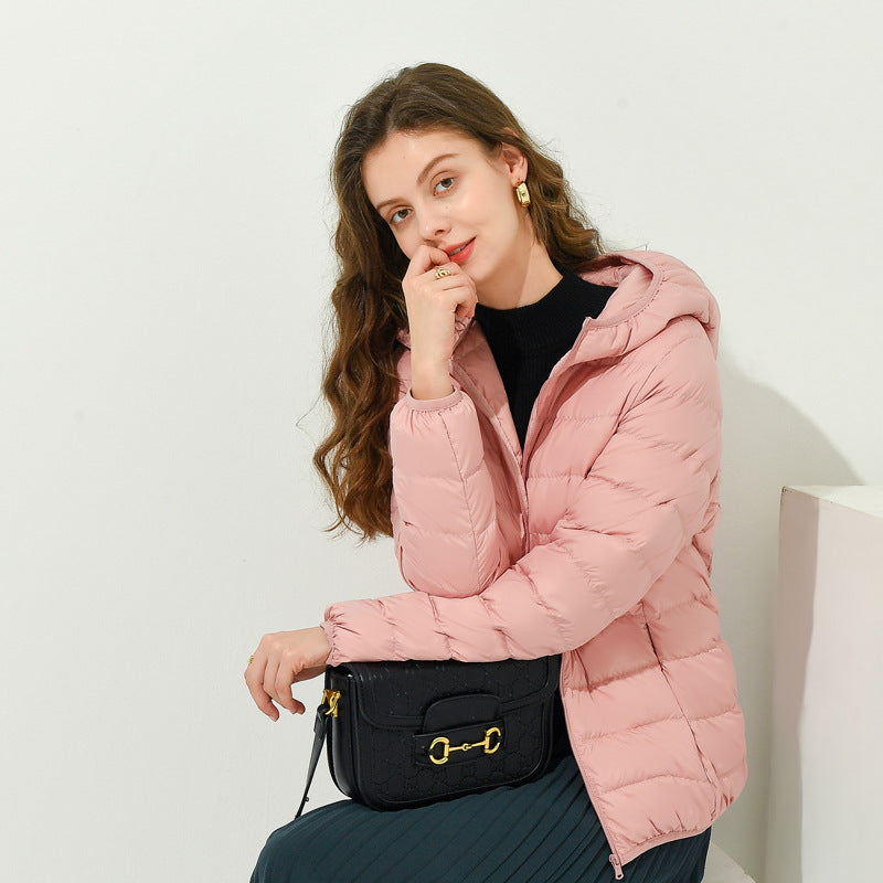 Women's lightweight down jacket, blush pink, full-zip with stand collar and pockets