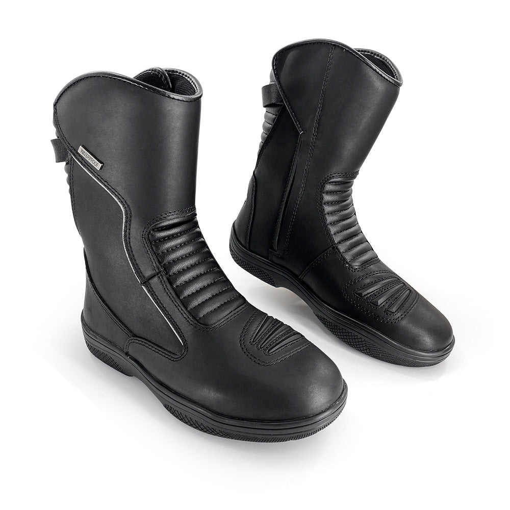 Black cycling winter boots, angled view with adjustable strap and thick non-slip sole