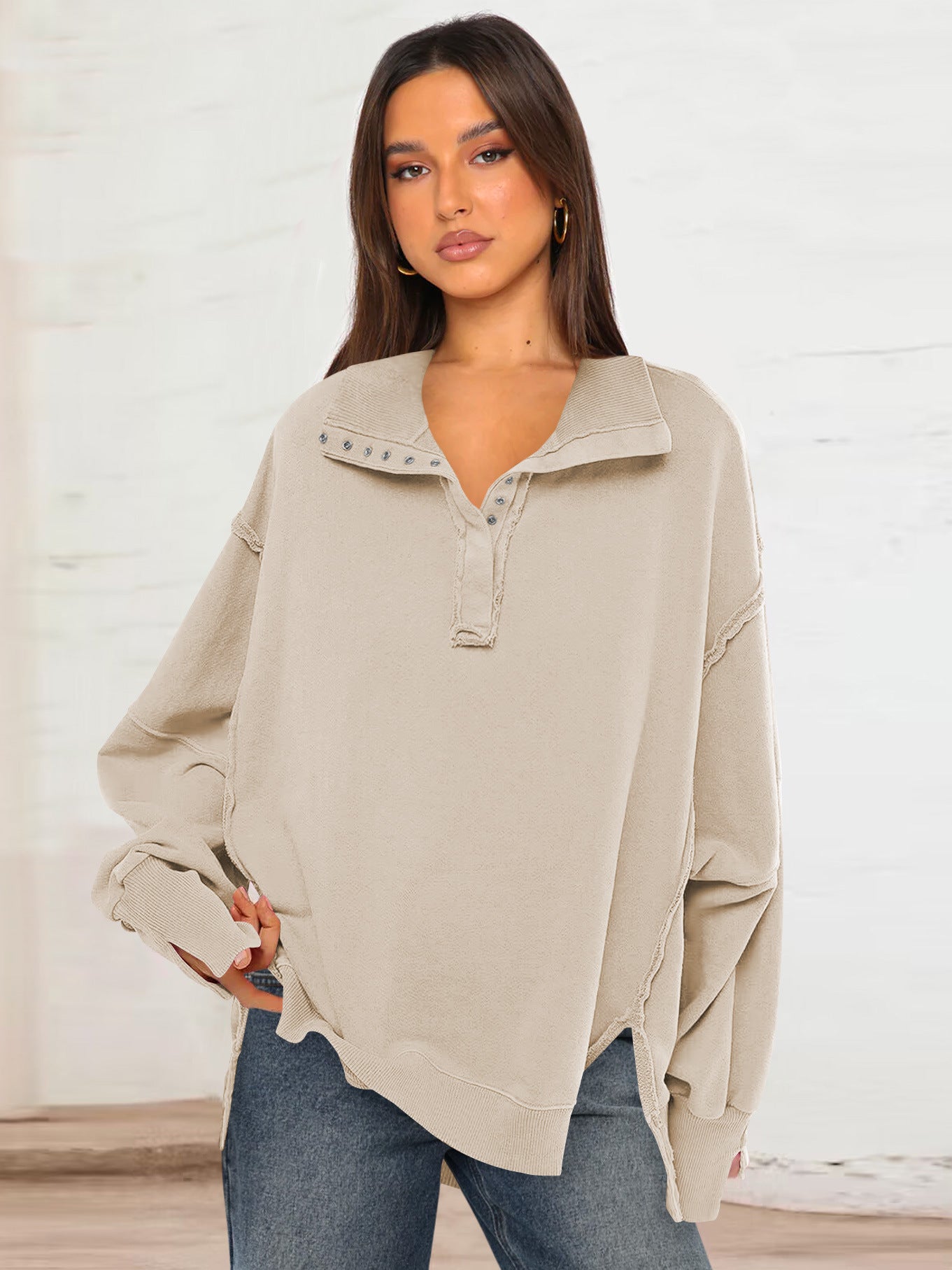 Women's light beige polo-collar sweatshirt top with lantern sleeves, side view