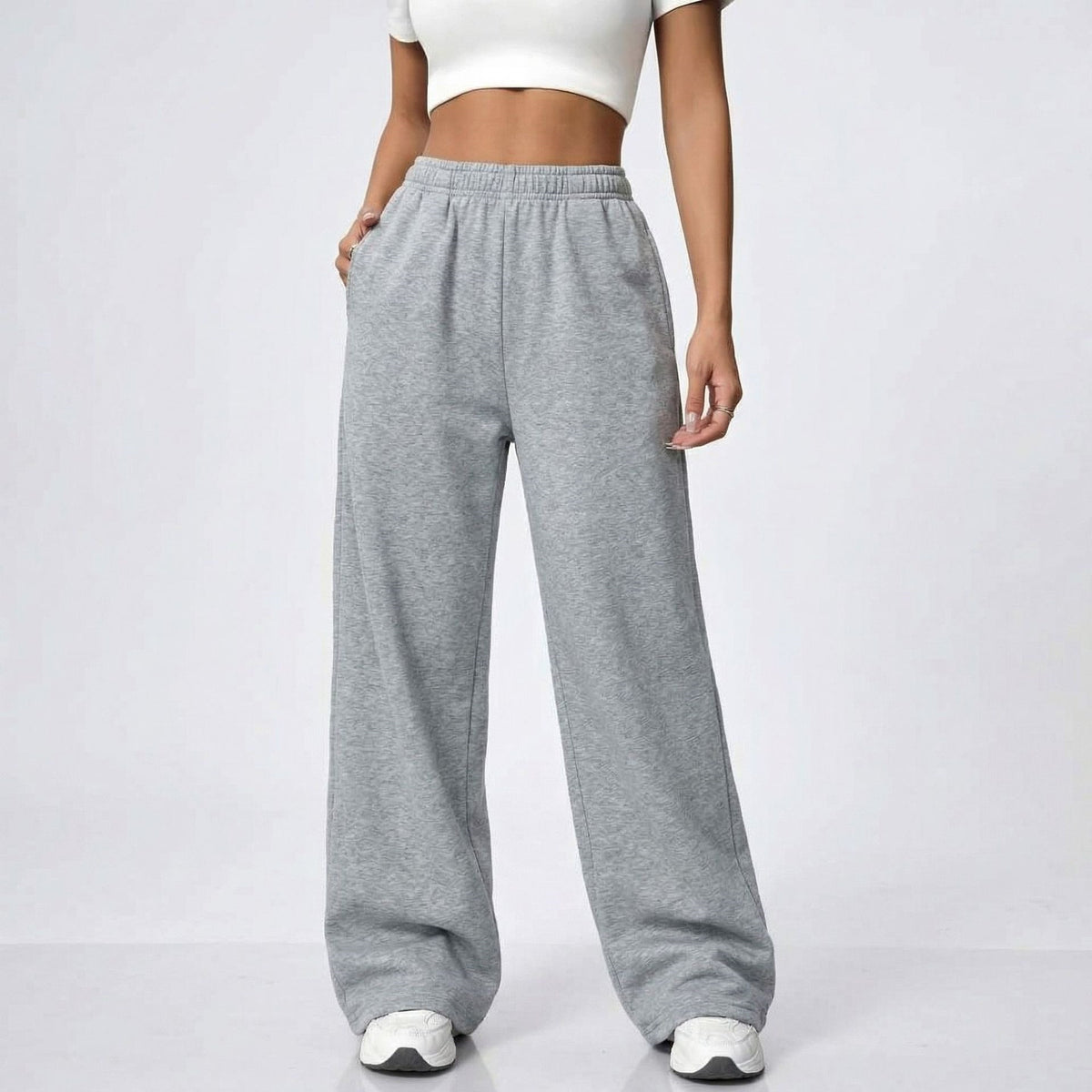 Women’s heather gray wide-leg sweatpants with elastic waist and loose straight fit