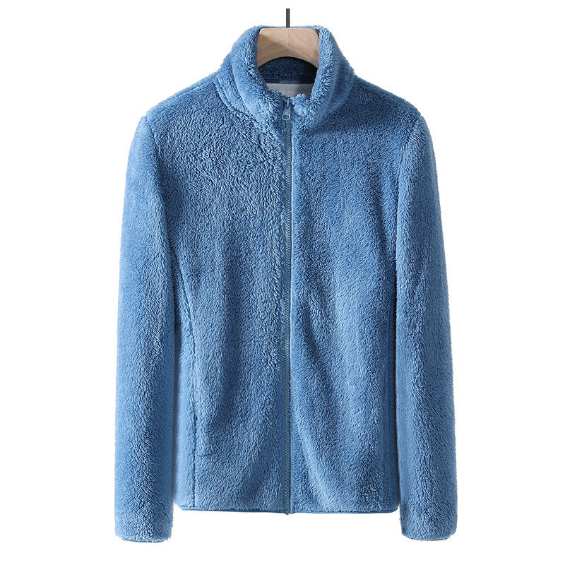 Blue fleece zip jacket with stand collar, front view on hanger