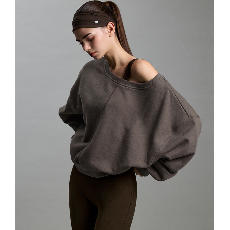 Off-shoulder blue-gray sweatshirt with dropped shoulders and long sleeves