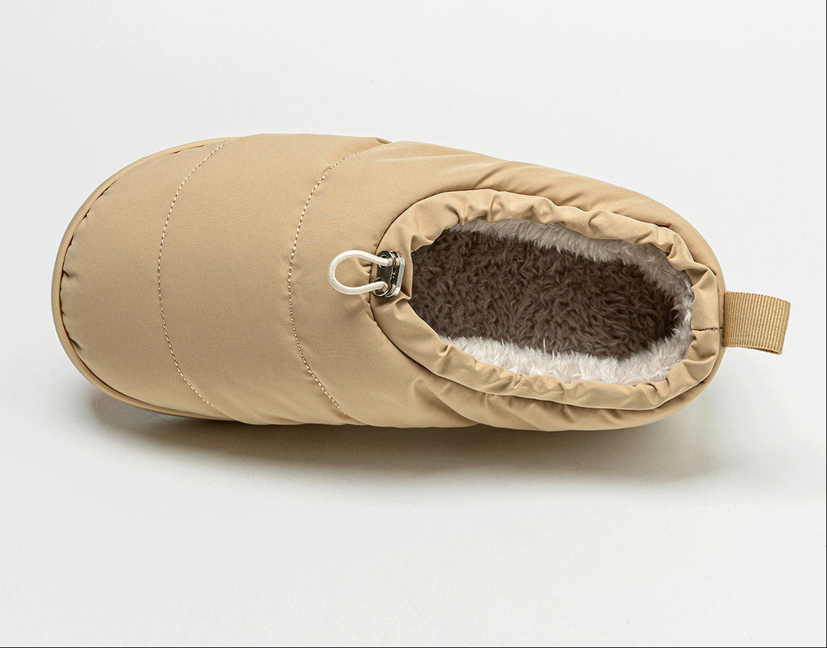 Men's beige cotton slipper with fleece lining and cinch strap detail, closed toe