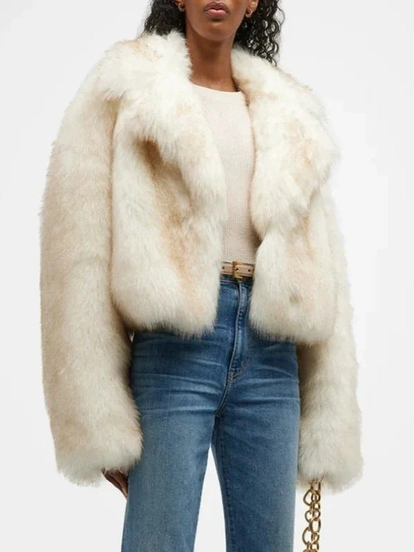 Women's cream faux fur jacket with pointed lapel, long sleeves, open front.