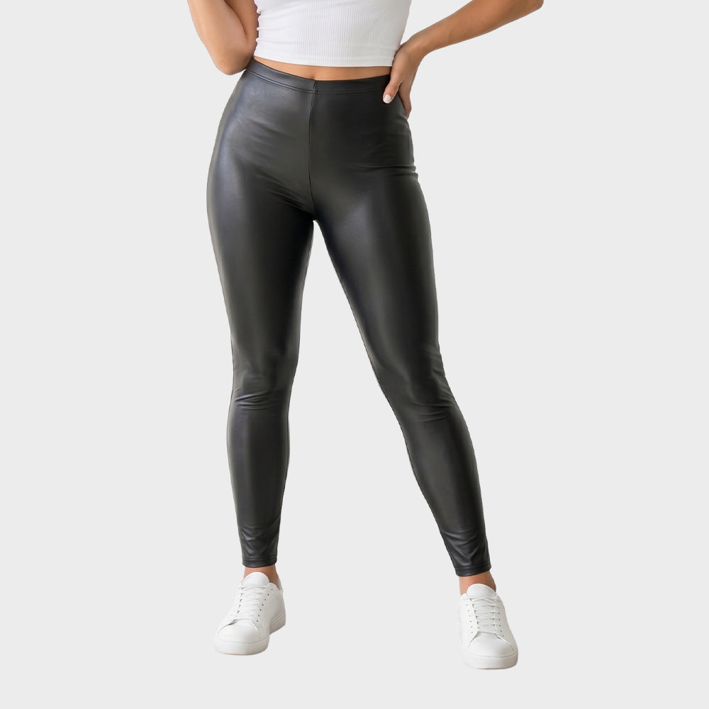 Black high-waisted faux leather leggings with elastic waistband, skinny fit