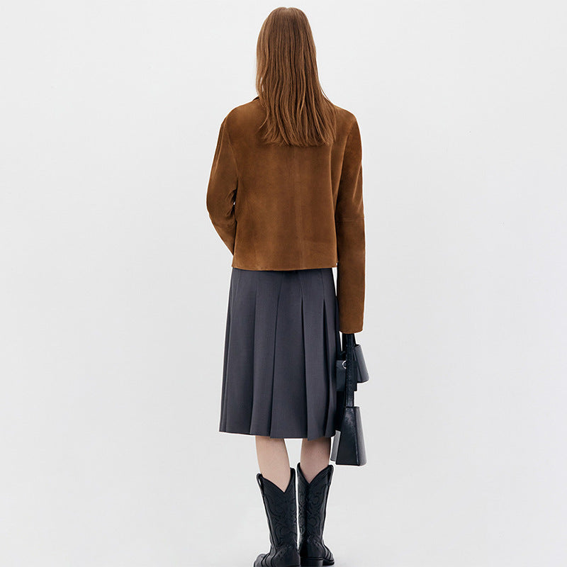 Back view of the brown suede jacket, showing its cropped hem and straight sleeves.