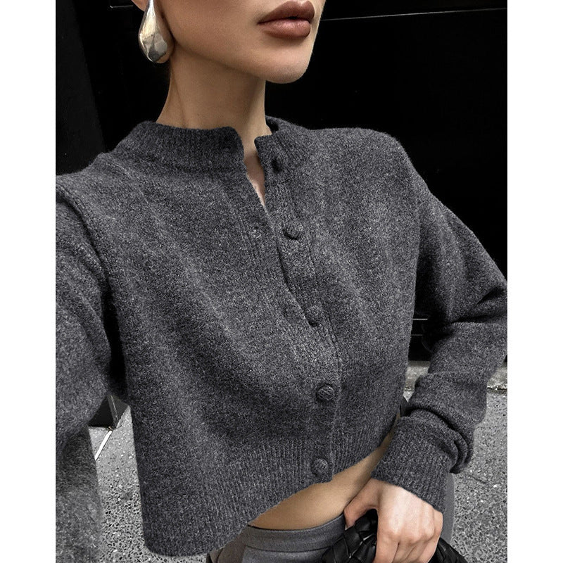 Gray wool knit button-front top with stand collar, long sleeves close-up