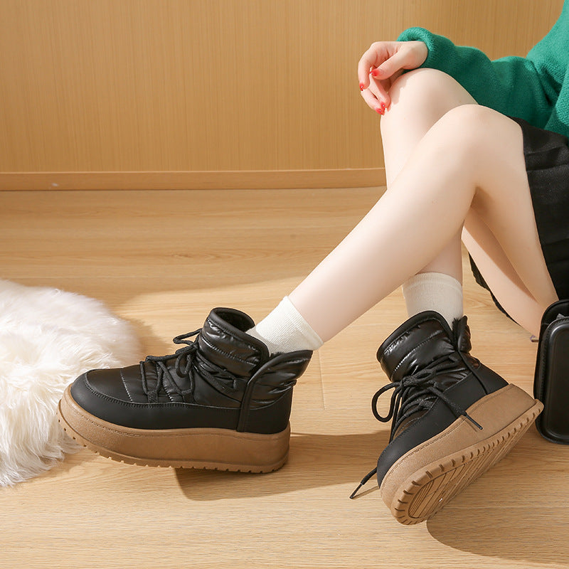 Black high-top lace-up boots with fleece lining and chunky rubber sole