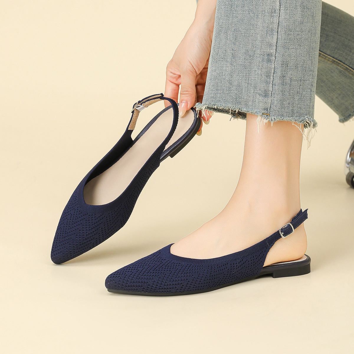 Navy blue netted woven pointed-toe slingback flats with low thick heel and strap