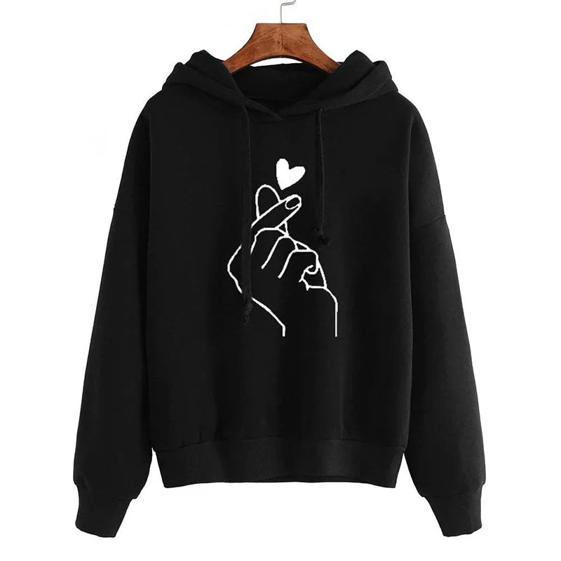 Black fleece hoodie with white finger-heart graphic and drawstrings