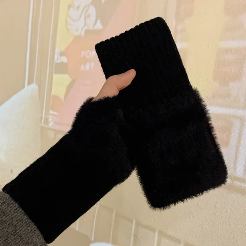 Black fingerless gloves with plush hand panels and ribbed knit wrists