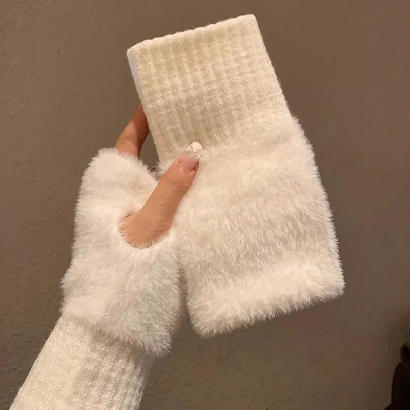 White fingerless gloves with fluffy cuffs and ribbed knit wrists