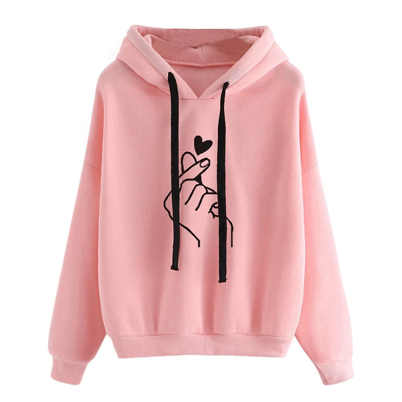 Pink fleece hoodie with black drawstrings and finger-heart graphic