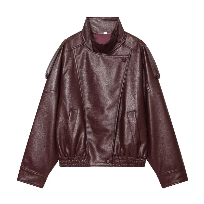 Wine red faux leather jacket with a high collar, snap-front closure, side pockets, and elastic hem