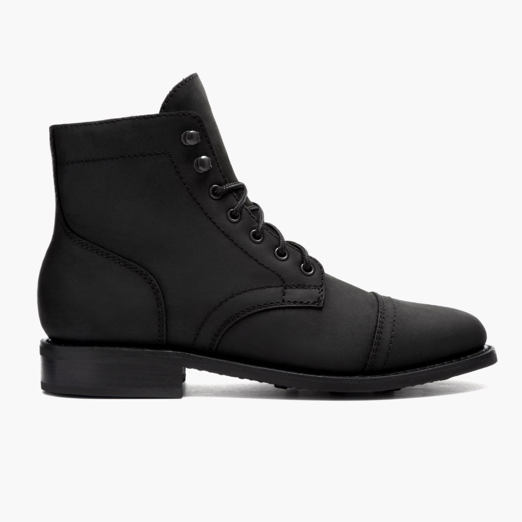 Black matte leather lace-up ankle boots with side pull tab and chunky heel