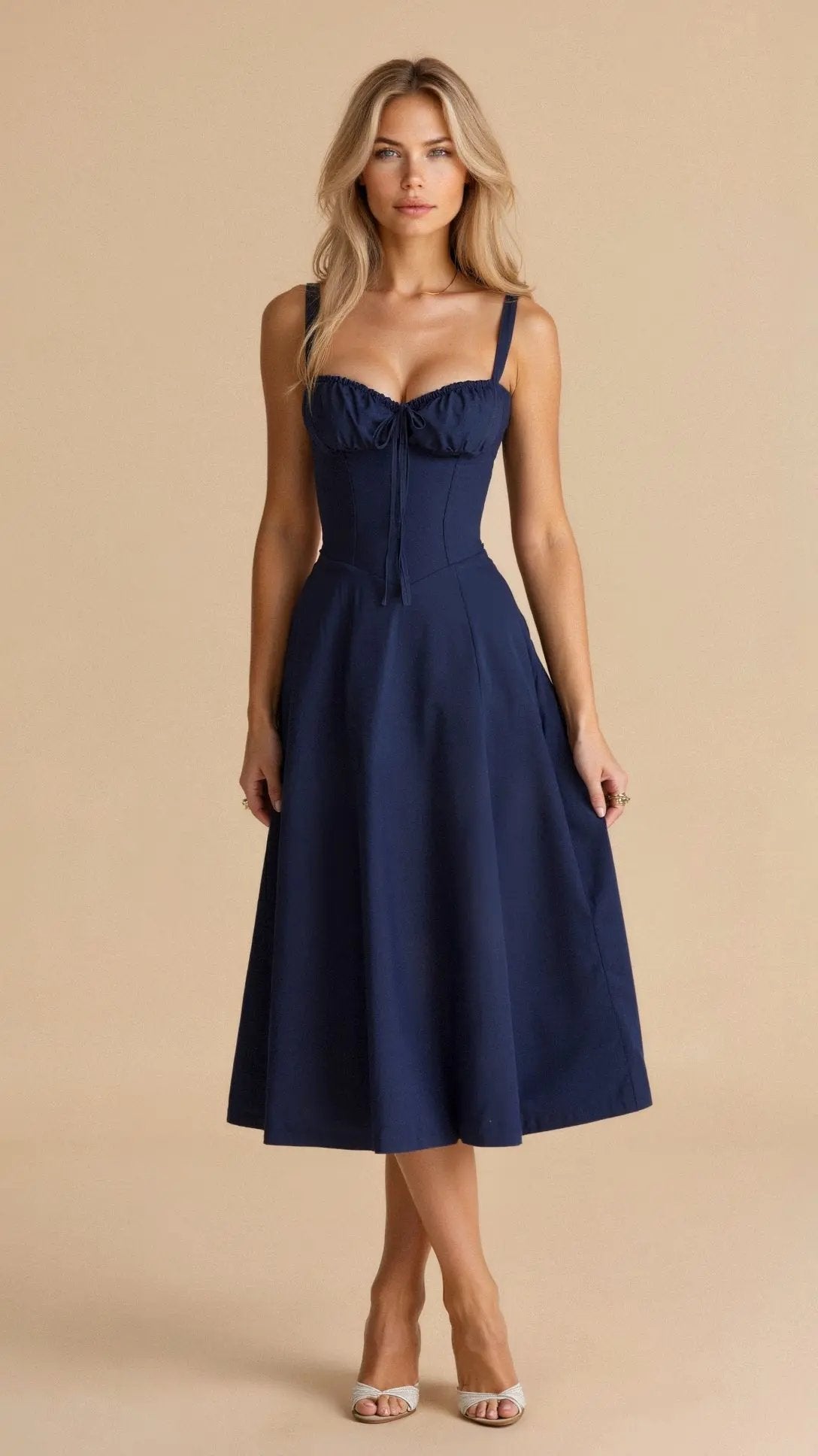 Navy sleeveless midi dress with sweetheart neckline and gathered waist seam