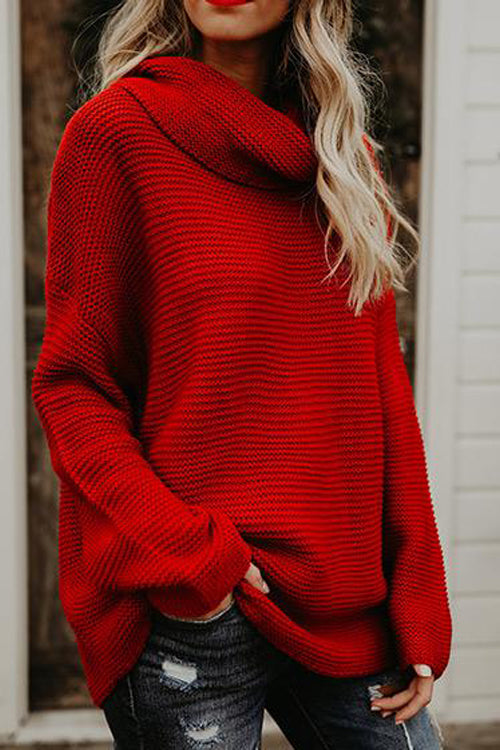 Red knit high-neck sweater with long sleeves and ribbed cuffs.