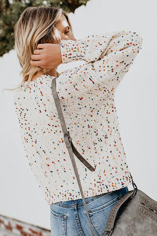 Beige speckled dot knit sweater with crew neck and long puff sleeves