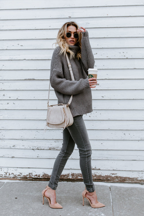 Grey light high-neck knit sweater with long sleeves and relaxed fit