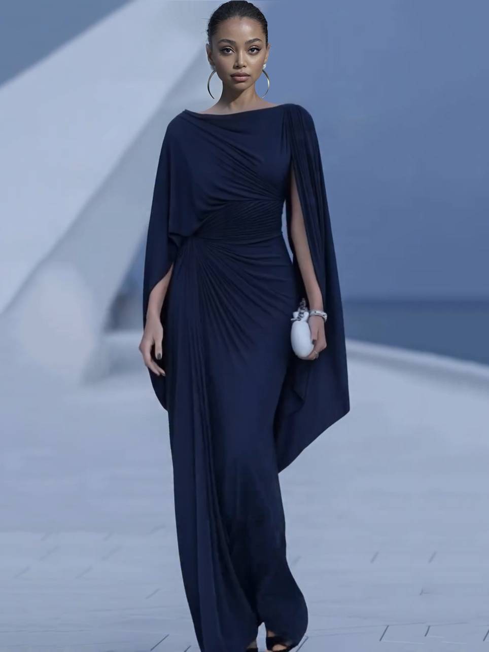 Navy chiffon maxi dress with boat neck, ruched waist, and cape sleeves drape