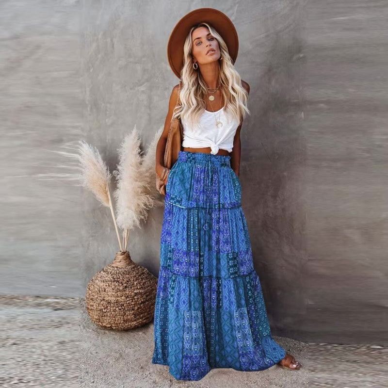 Tiered cotton maxi skirt with patchwork floral print, elastic waist, blue