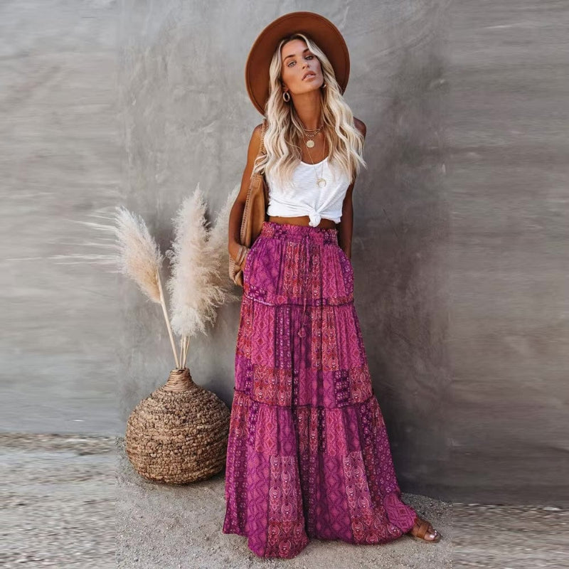 Tiered cotton maxi skirt with patchwork floral print, elastic waist, purple