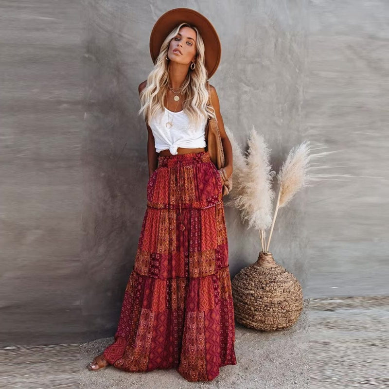 Tiered cotton maxi skirt with patchwork floral print, elastic waist, deep red