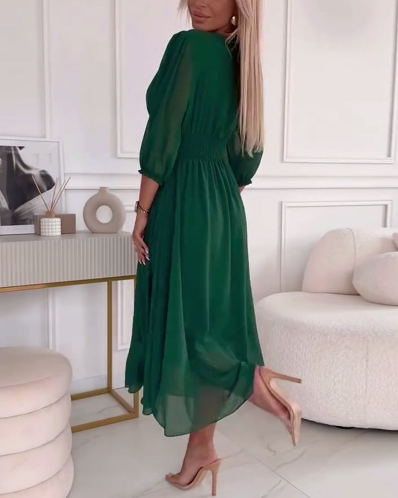 Green chiffon midi dress with V-neck, ruched waist, and flowing puff sleeves