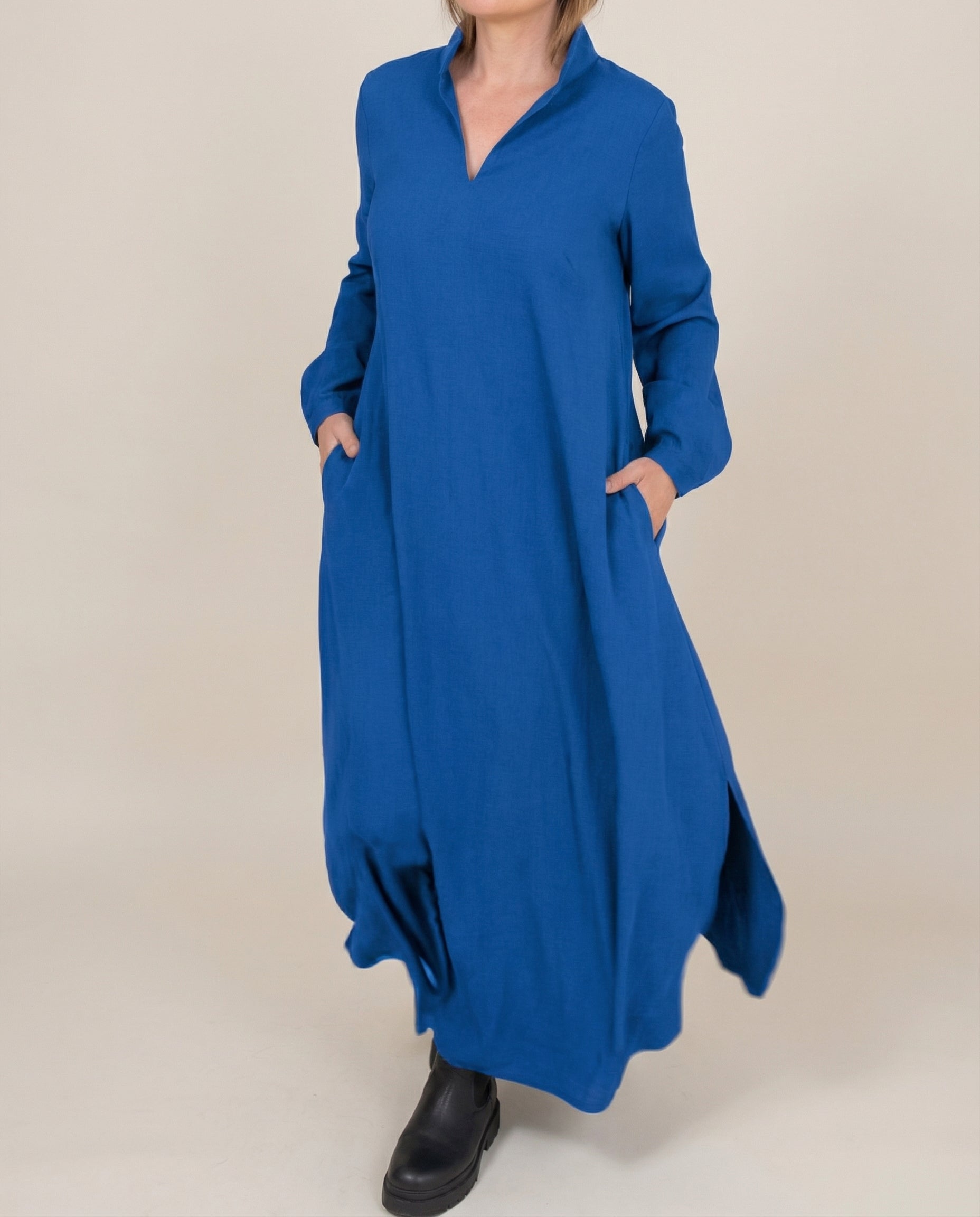 Blue long-sleeve linen maxi dress with stand collar and side pockets, loose fit