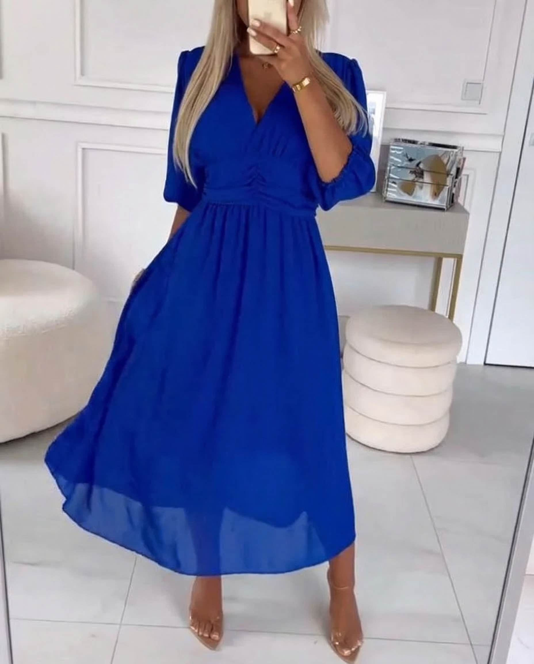 Blue chiffon midi dress with V-neck, ruched waist, and puff sleeves