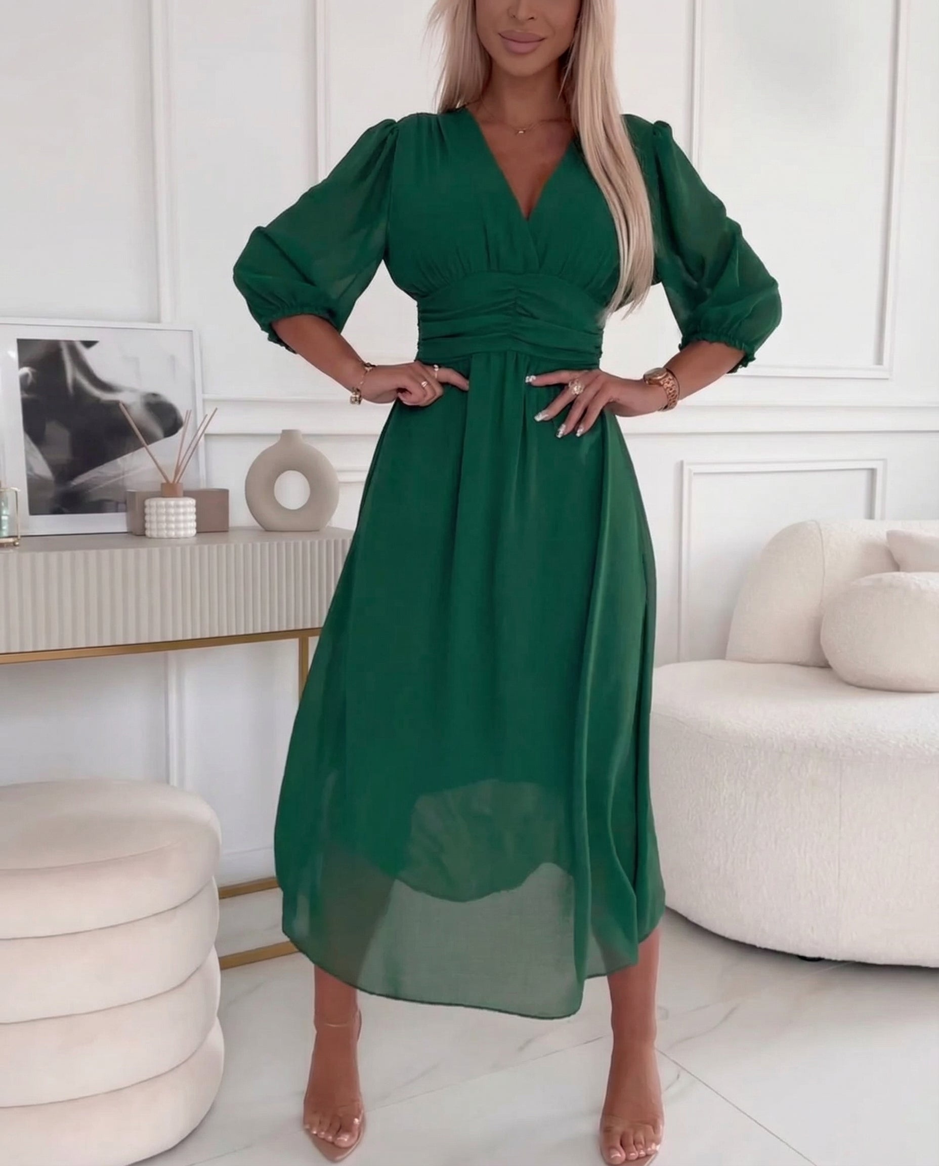 Green chiffon midi dress with V-neck, ruched waist, and puff sleeves