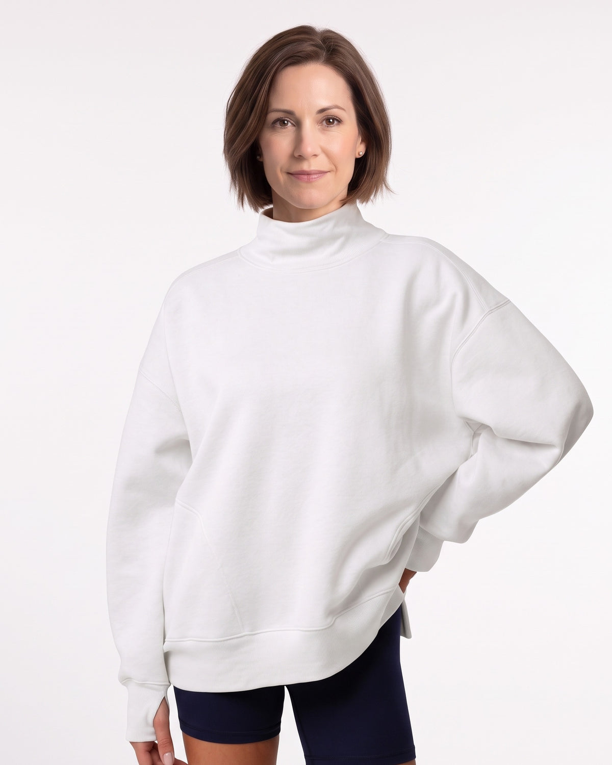 White mock neck sweatshirt with relaxed drop-shoulder fit, long sleeves