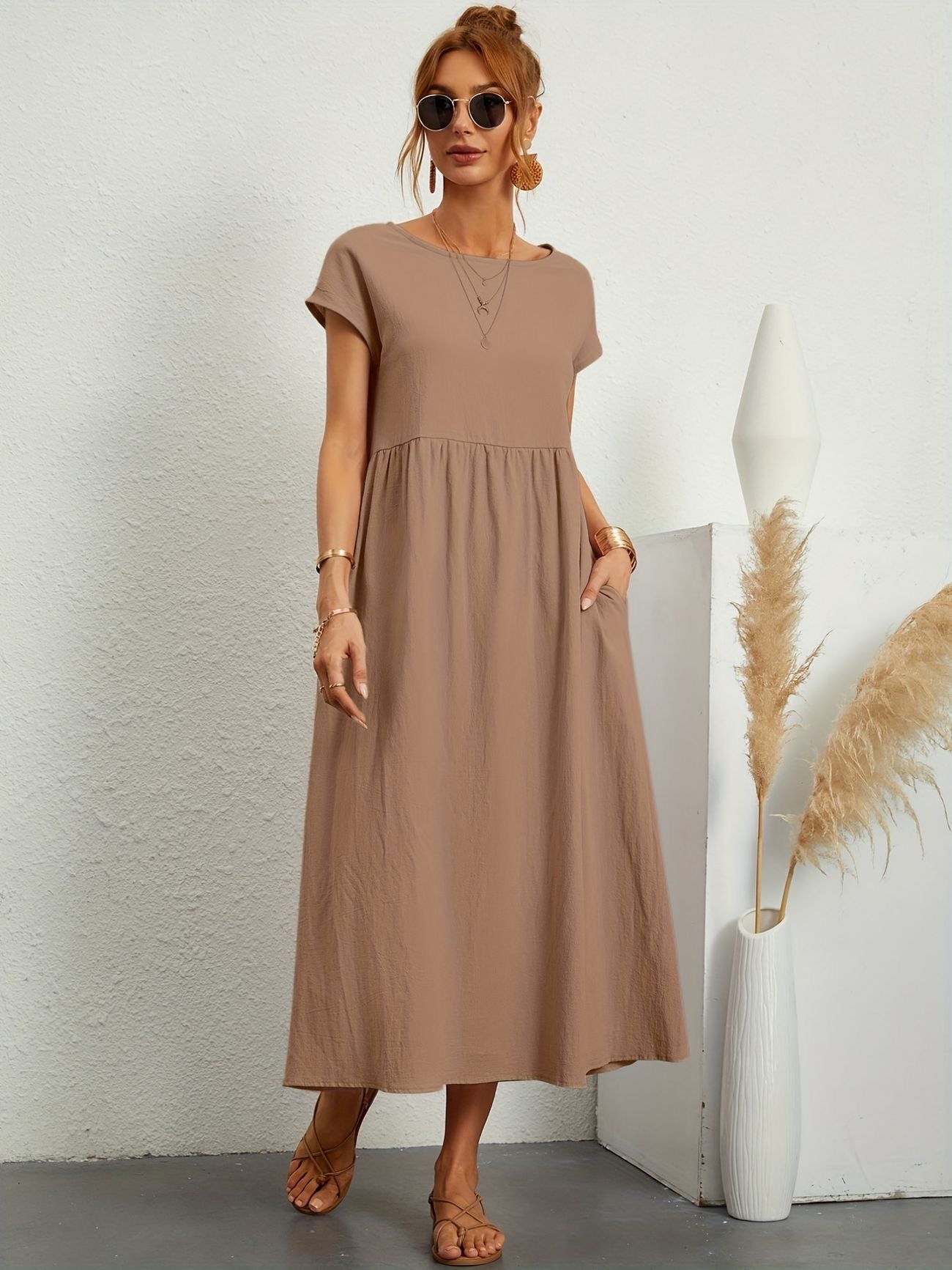 Taupe maxi dress with gathered smocked bodice and short sleeves, loose fit