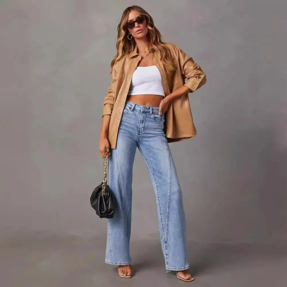 Women's high-rise blue flare jeans with light wash and flared leg openings