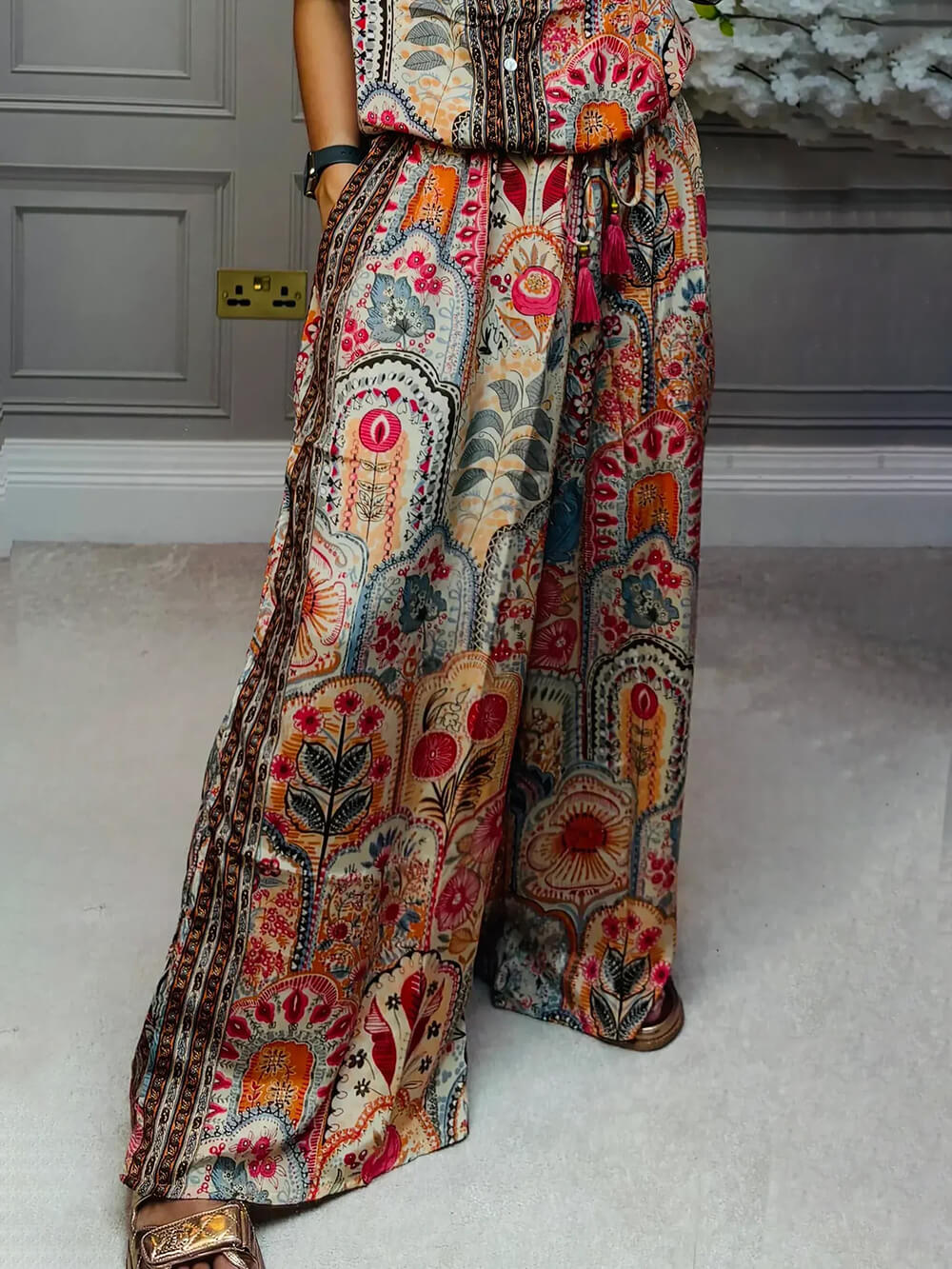 Red boho paisley blouse with short sleeves and drawstring waist detail