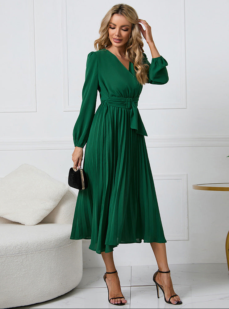 Green long-sleeve midi dress with V-neck and gathered waist, pleated skirt