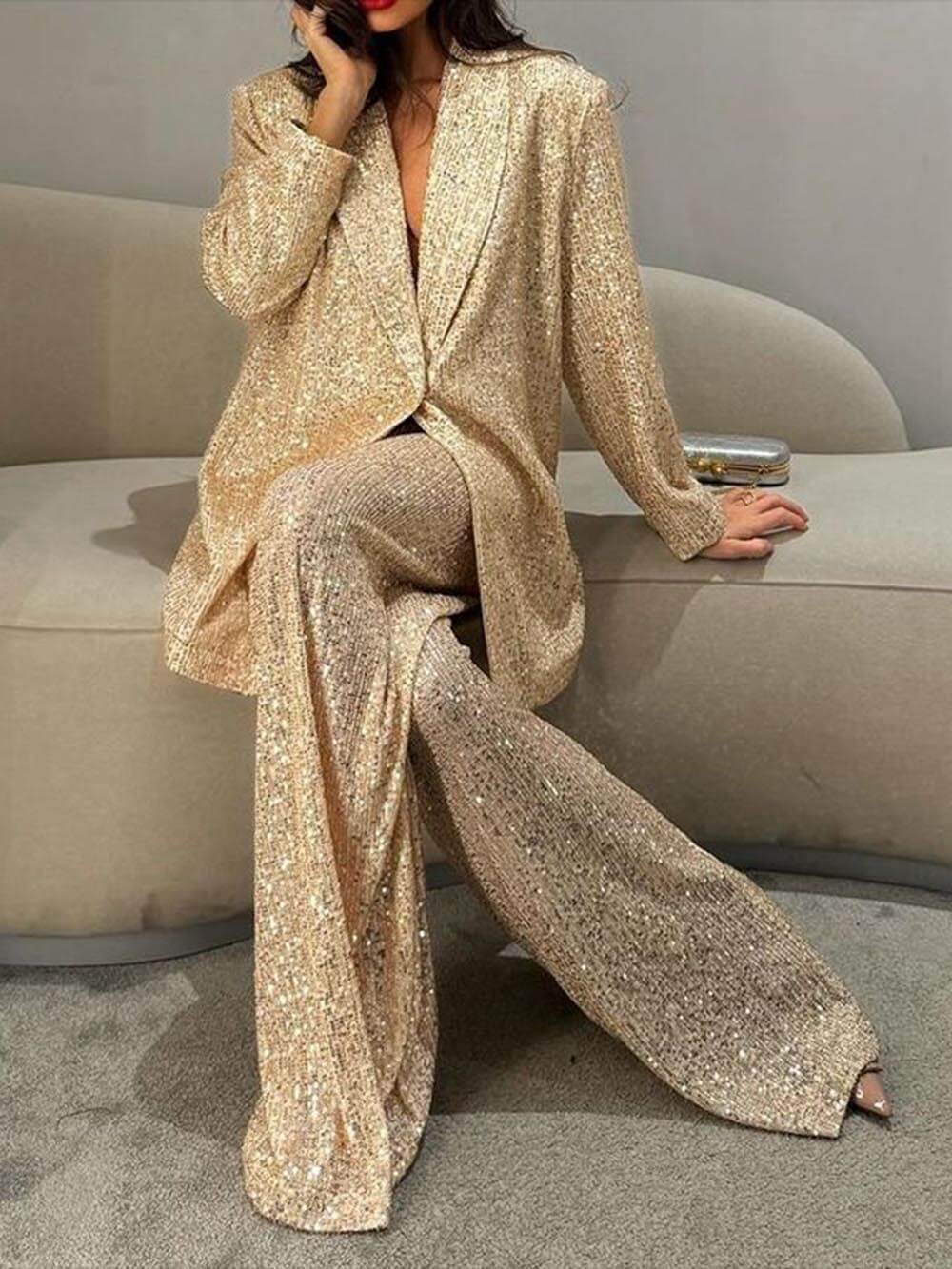 Gold sequin longline blazer with open V-neck and oversized relaxed silhouette