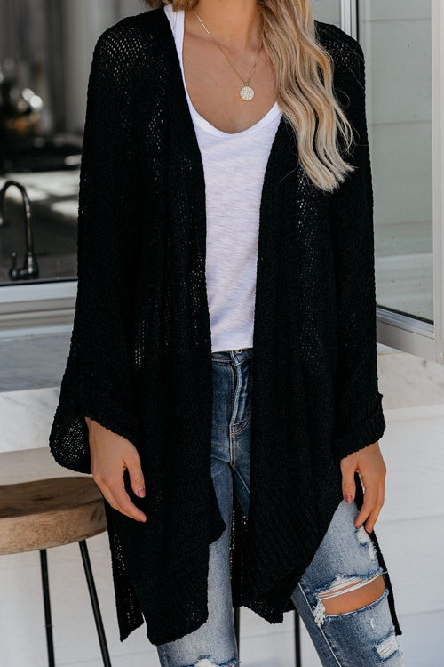 Long sleeve knit cardigan in black with open front and textured knit texture