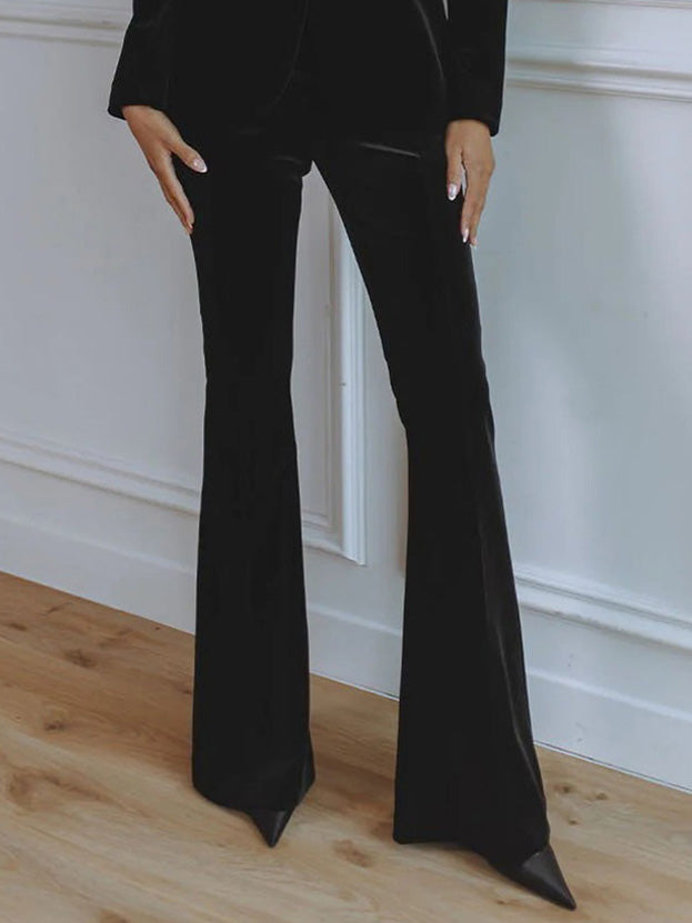 Women’s black velvet blazer with flared trousers, side seam and hem detail