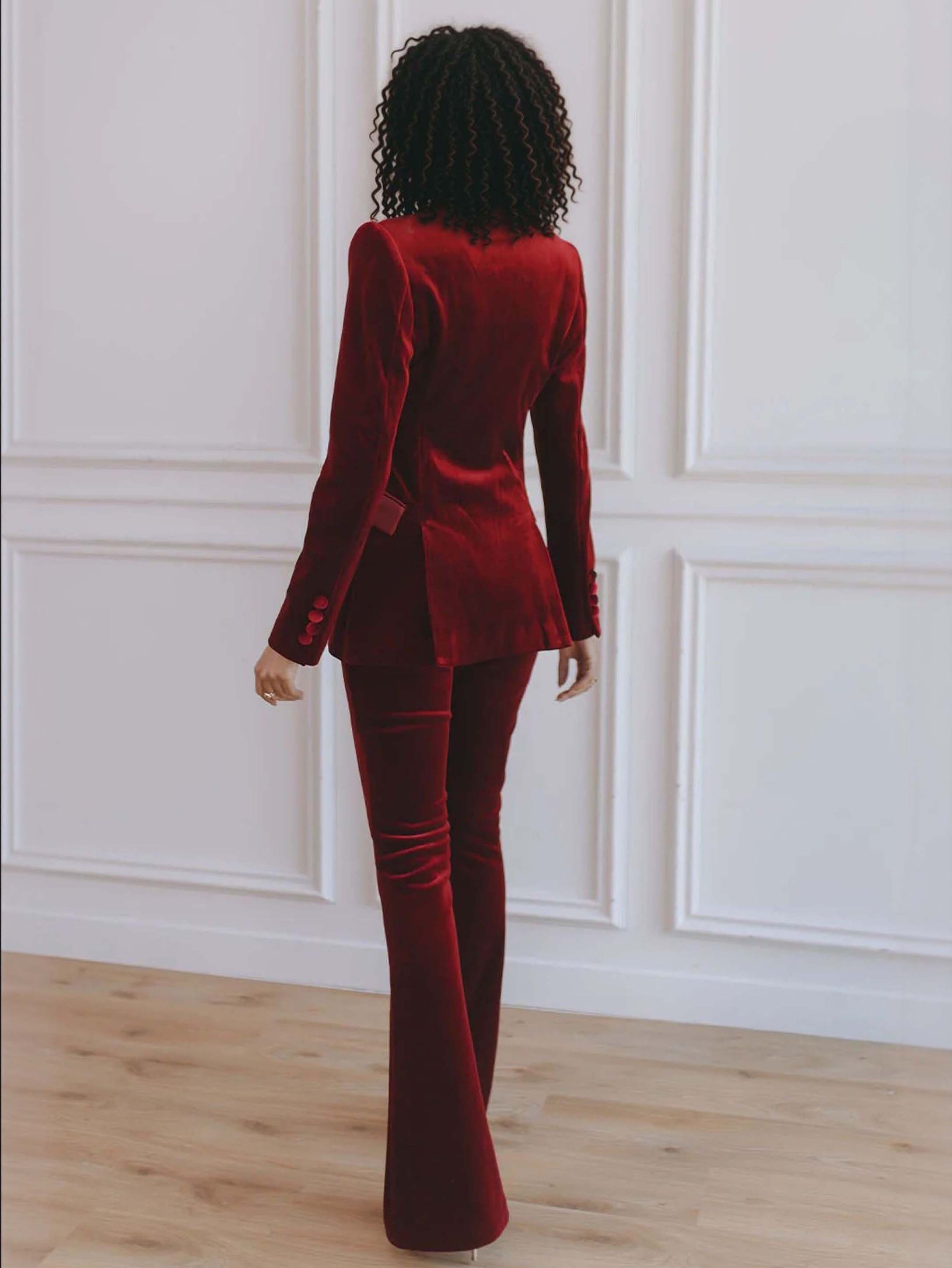 Women’s red velvet blazer, back view with slim waist seam and long sleeves