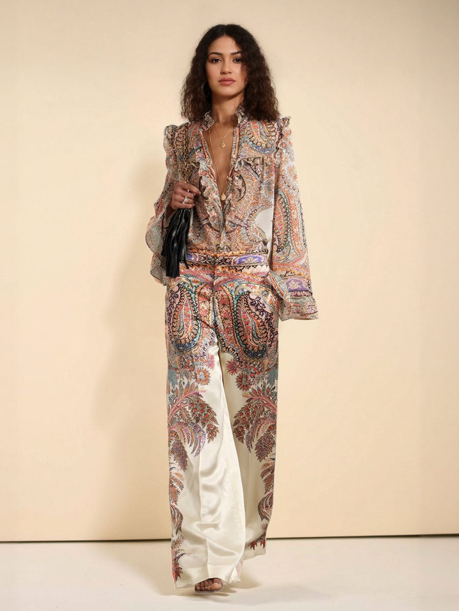 Cream paisley blouse with ruffle V-neck and flowing long bell sleeves