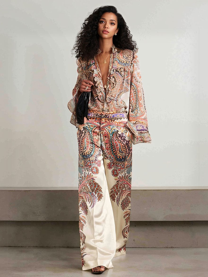 Cream paisley blouse with ruffle-trim V-neck and long flared bell sleeves