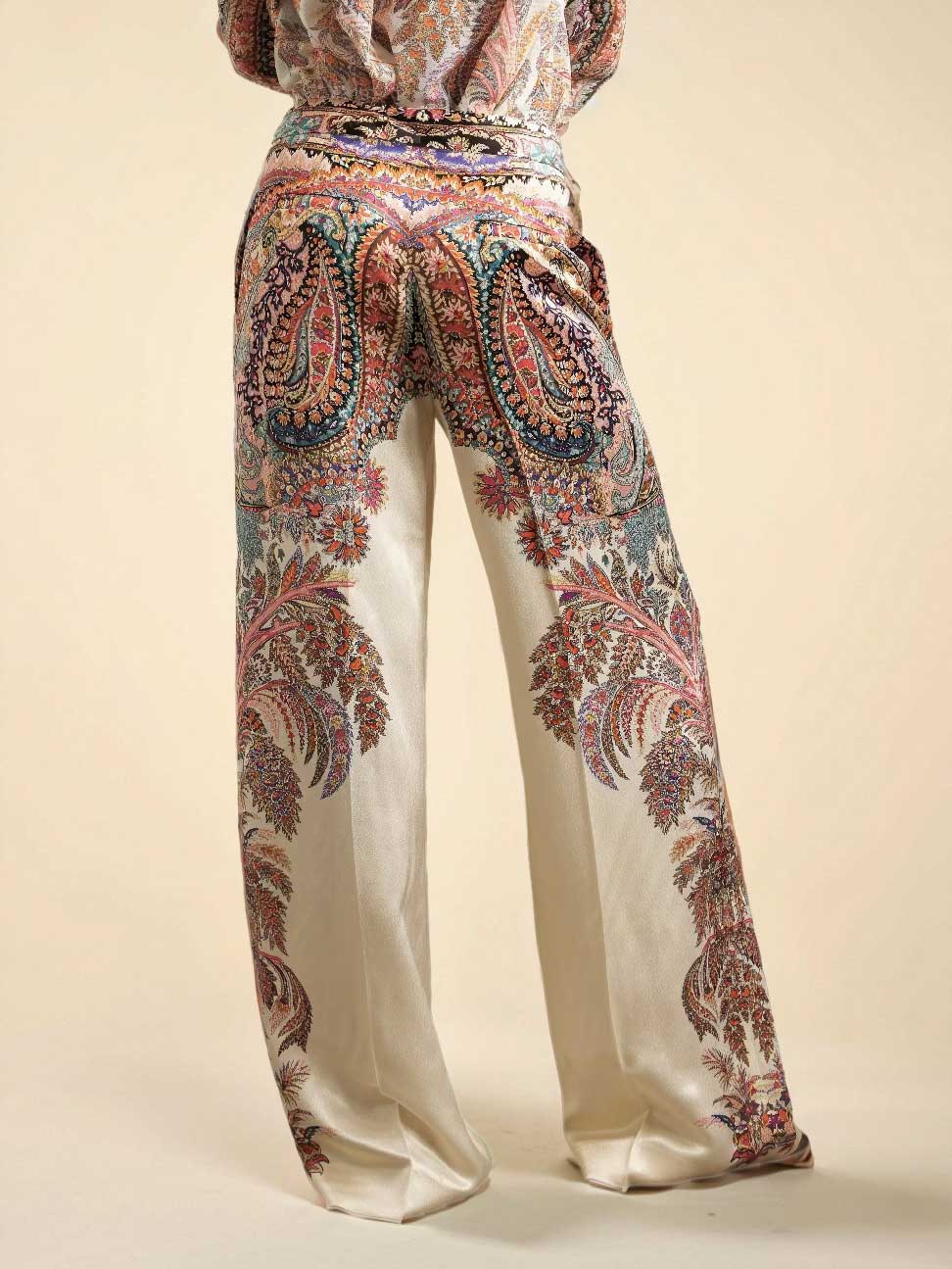Paisley print blouse hem with tied waist and flowing long bell sleeves