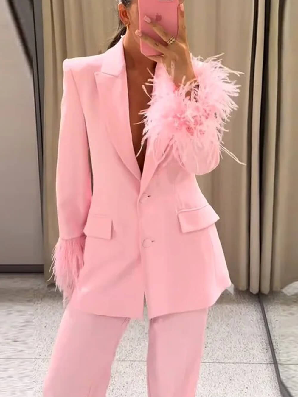 Pink crepe single-breasted blazer with feather-trim cuffs and flap pockets