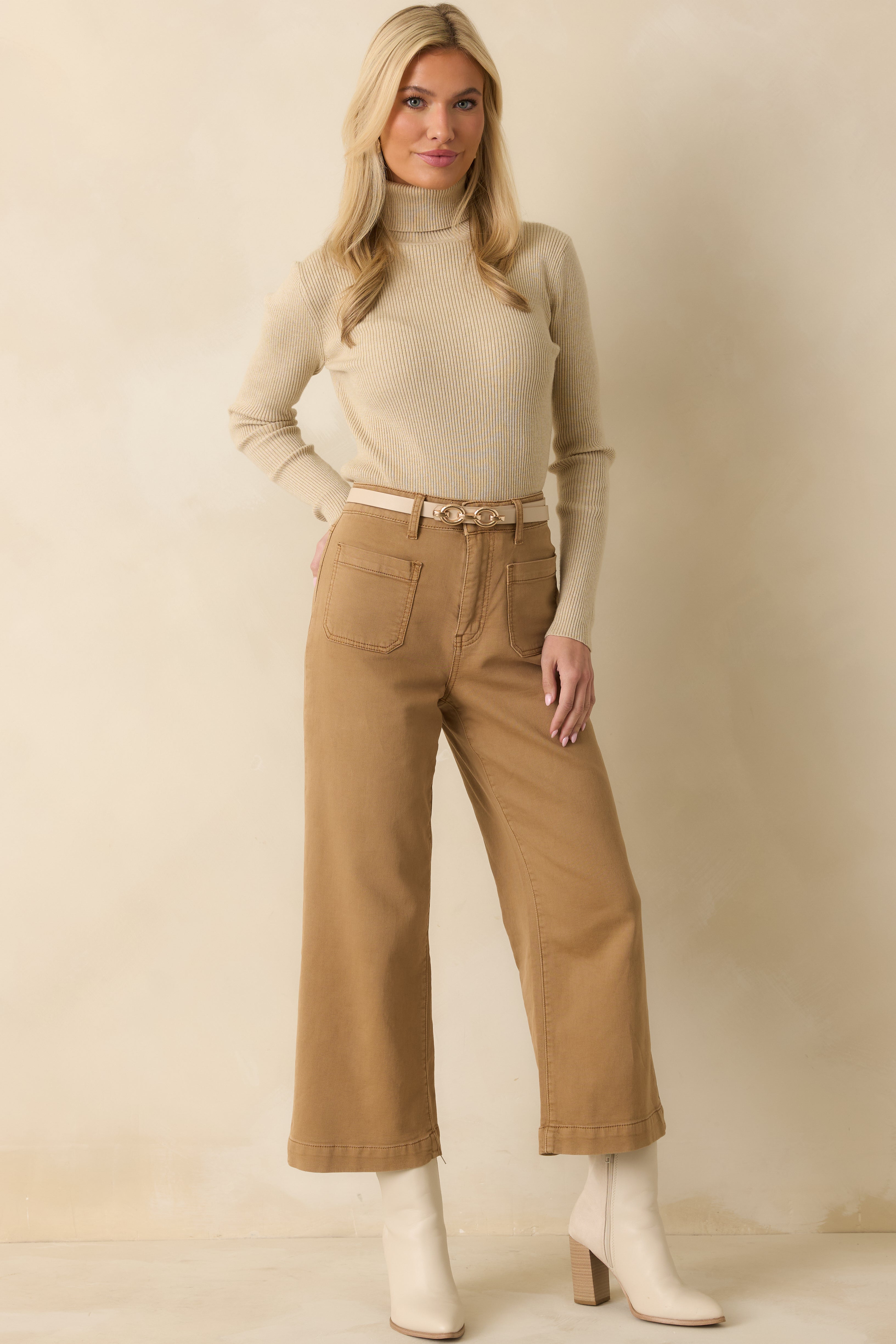 Beige fitted ribbed turtleneck sweater with long sleeves